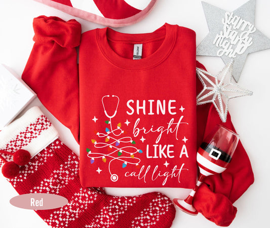 Funny Nurse Christmas Shirt, Nurse Christmas Gifts, Christmas Sweatshirt, Shine Bright Like A Call Light, RN Christmas Sweatshirt